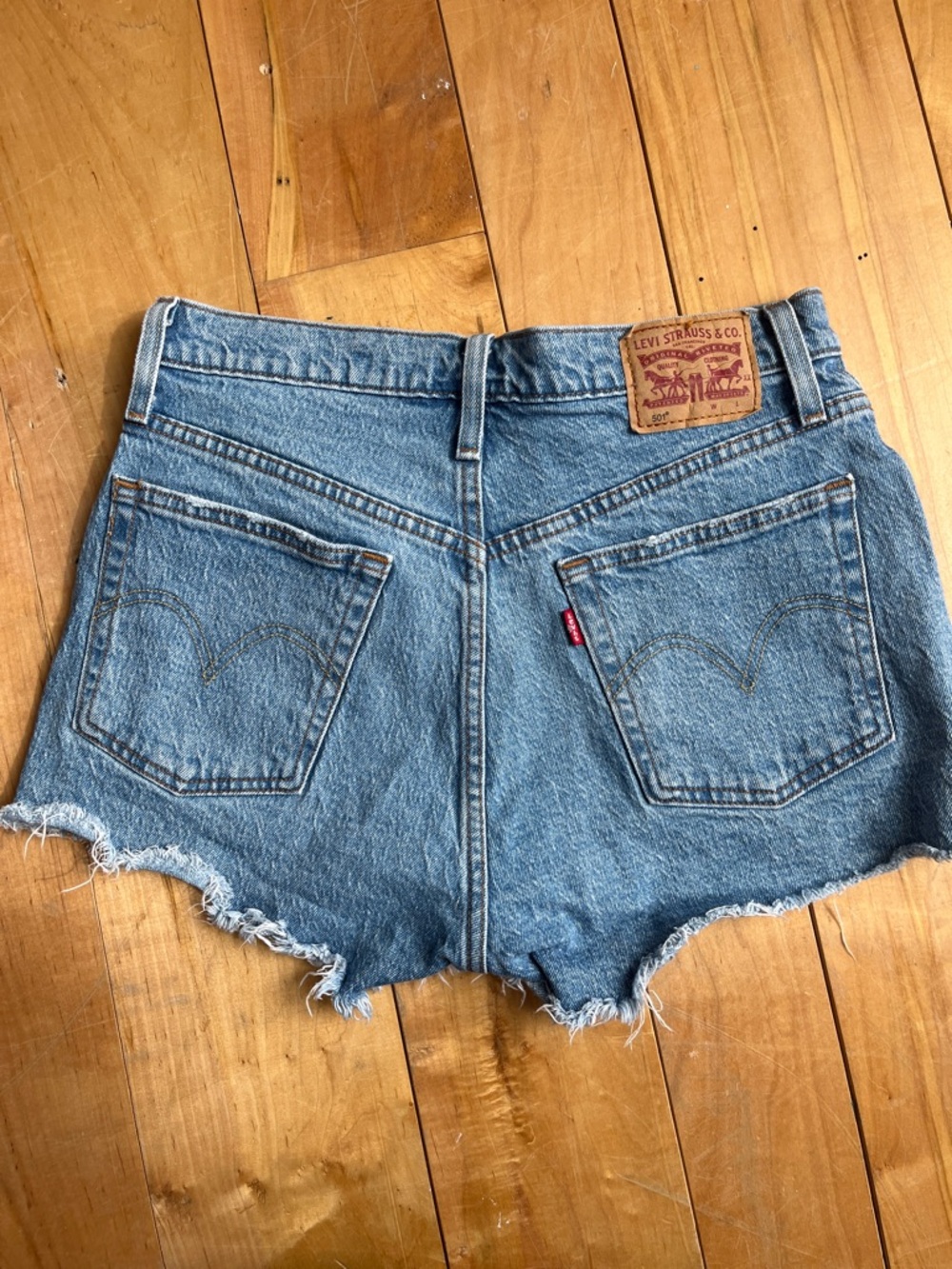 Levi's Light Blue Frayed Denim Cutoff Shorts